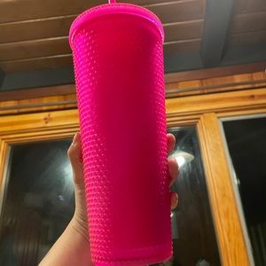 Pink studded Starbucks cup